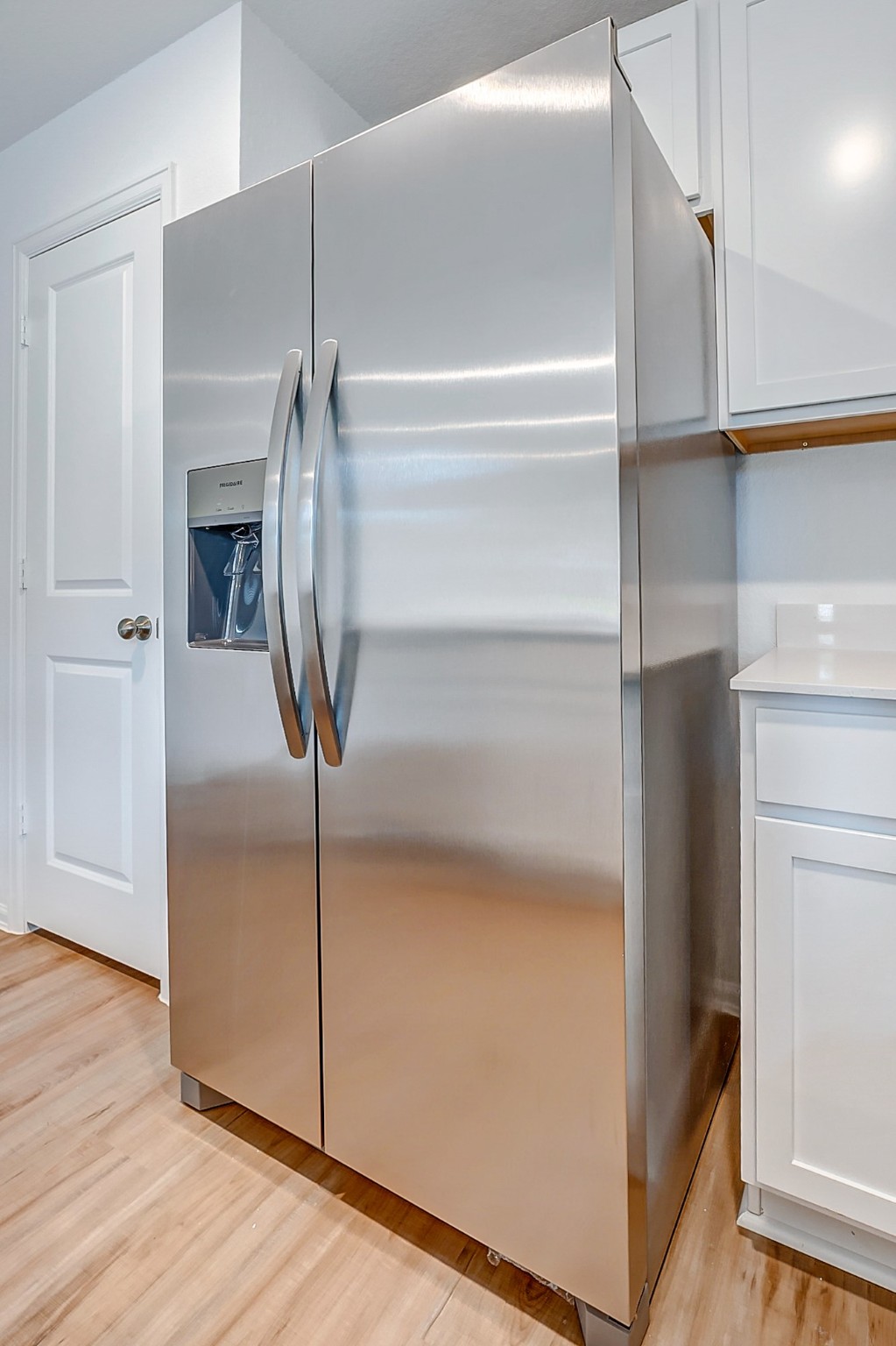 20961 Zuccala Drive New Caney, TX 77357 - Photo 10 of 33 a view of a livingroom with wooden floor