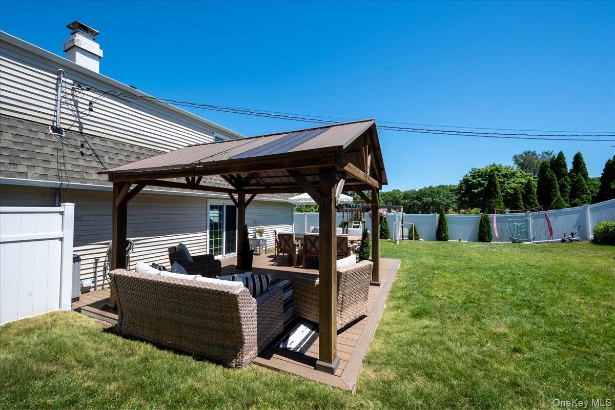 10 Rutgers Road Farmingville, NY 11738 - Photo 22 of 27 a view of outdoor space yard and patio