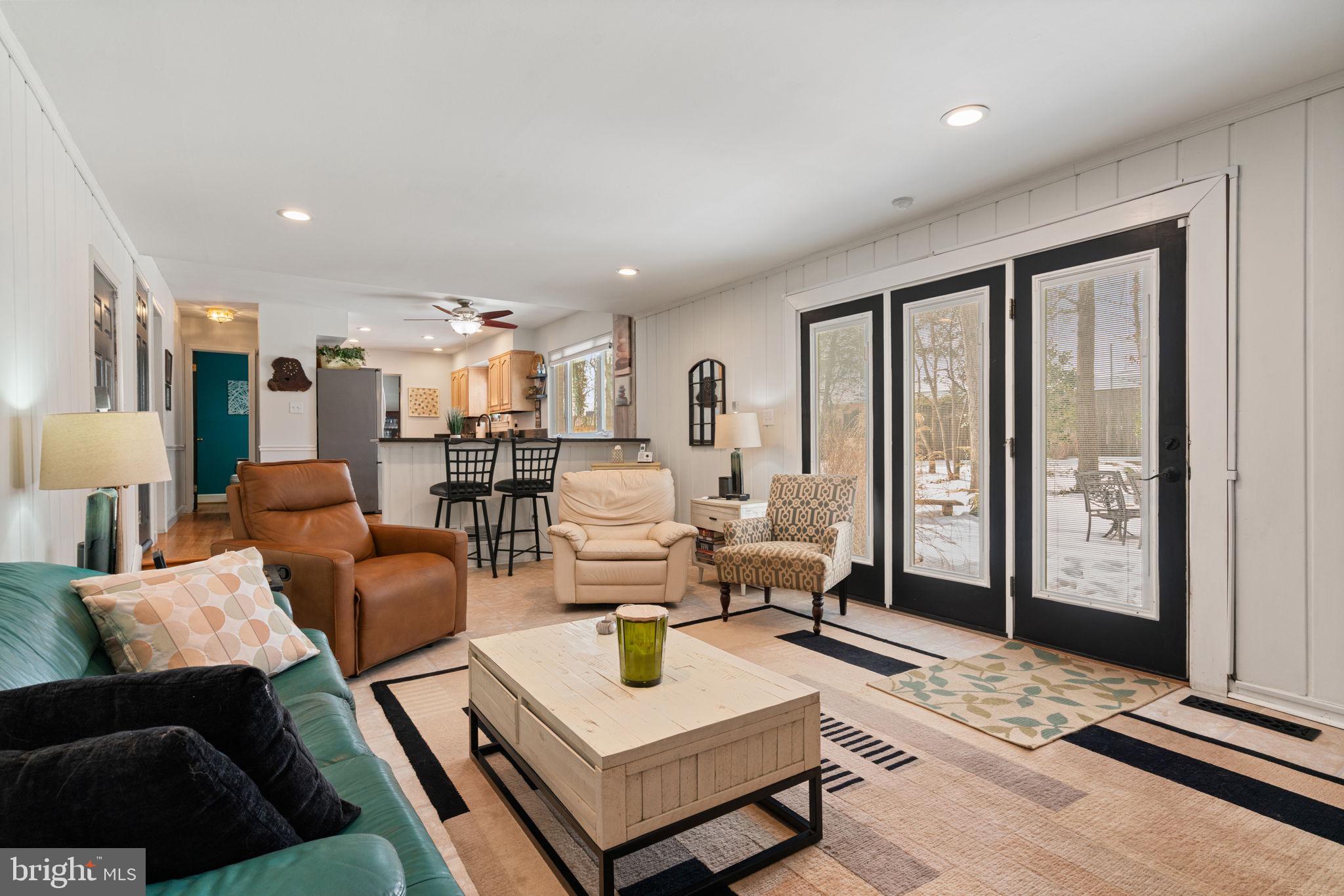 6102 Sherborn Lane Springfield, VA 22152 - Photo 21 of 51 a living room with furniture and a large window
