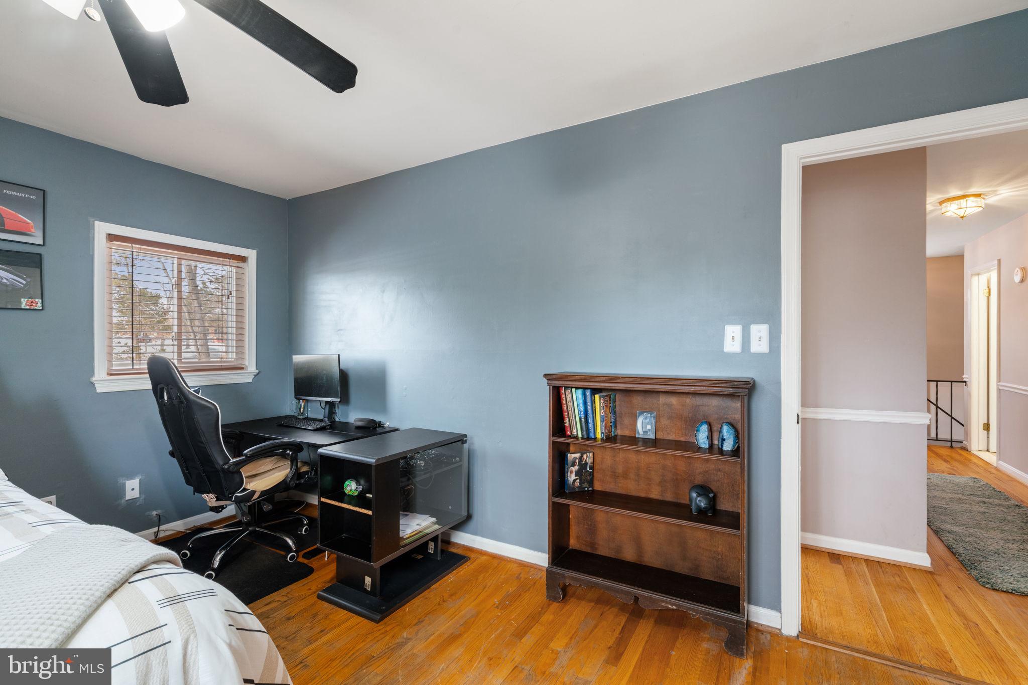 6102 Sherborn Lane Springfield, VA 22152 - Photo 27 of 51 a view of a workspace with furniture and bedroom