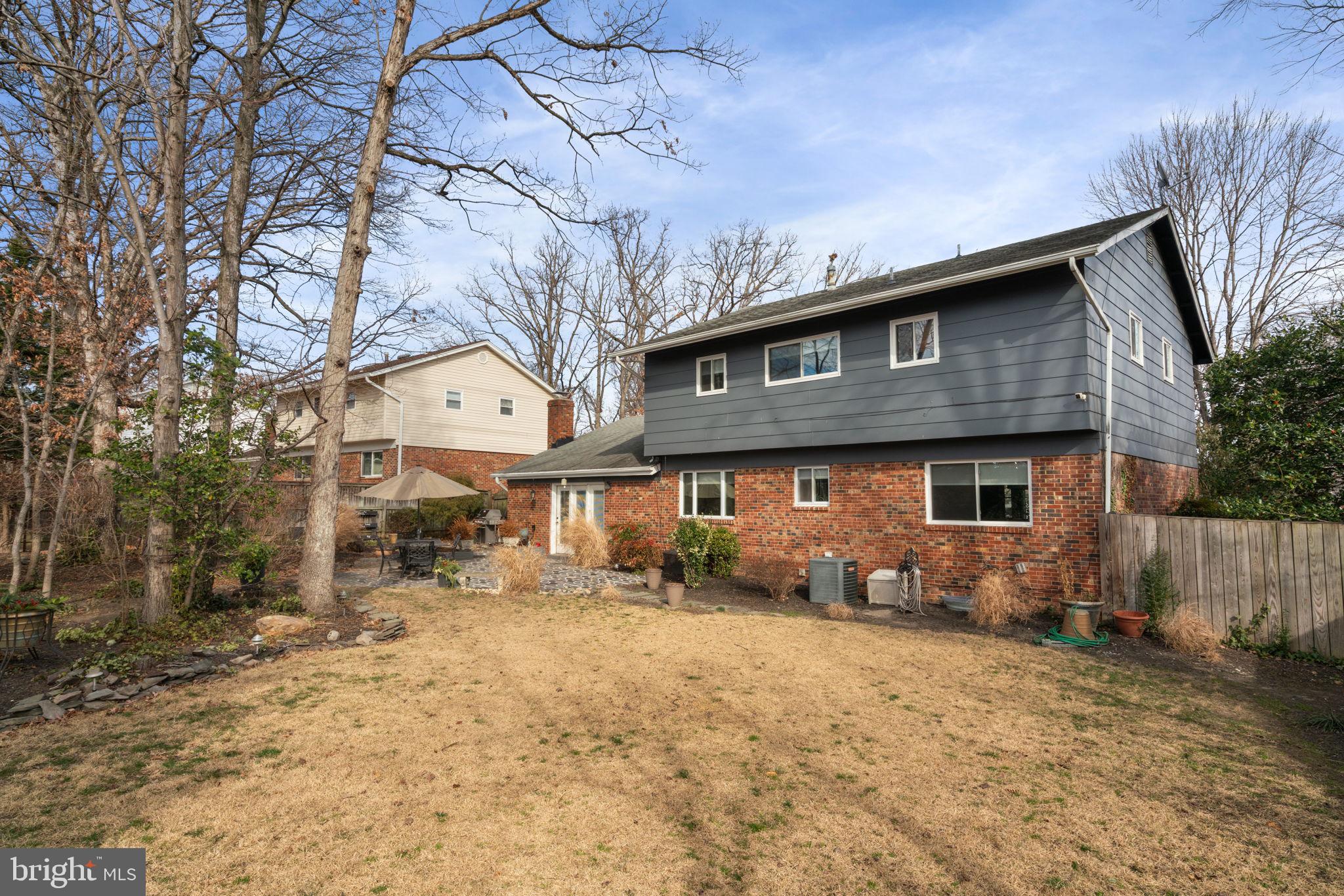 6102 Sherborn Lane Springfield, VA 22152 - Photo 37 of 51 a front view of a house with garden