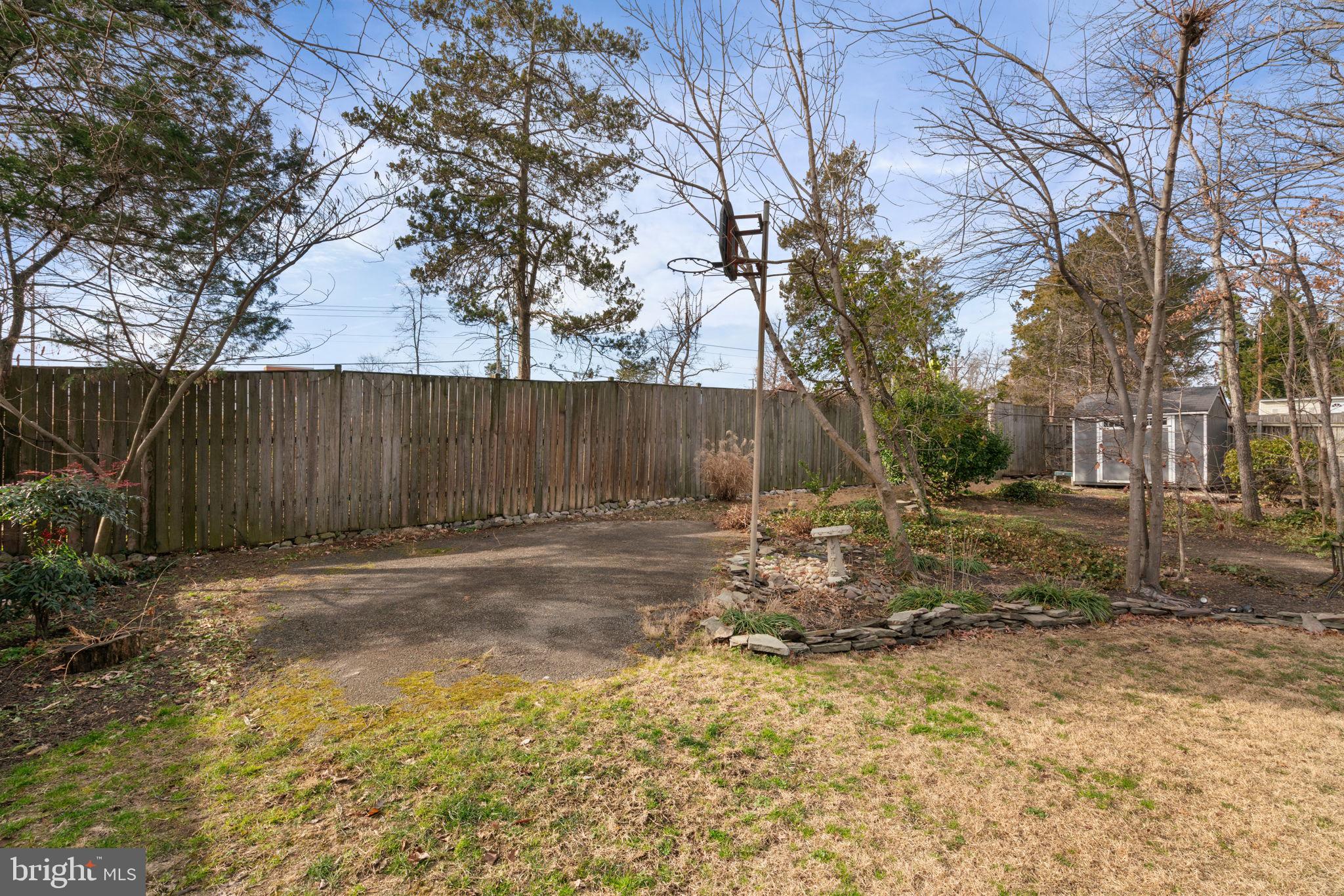 6102 Sherborn Lane Springfield, VA 22152 - Photo 40 of 51 a backyard of a house