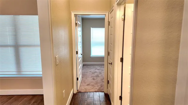 a bathroom with a granite countertop toilet sink and shower