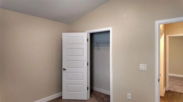 a house that has window in it and open area