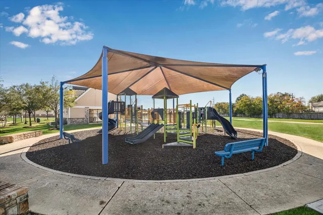 a view of a park with slide