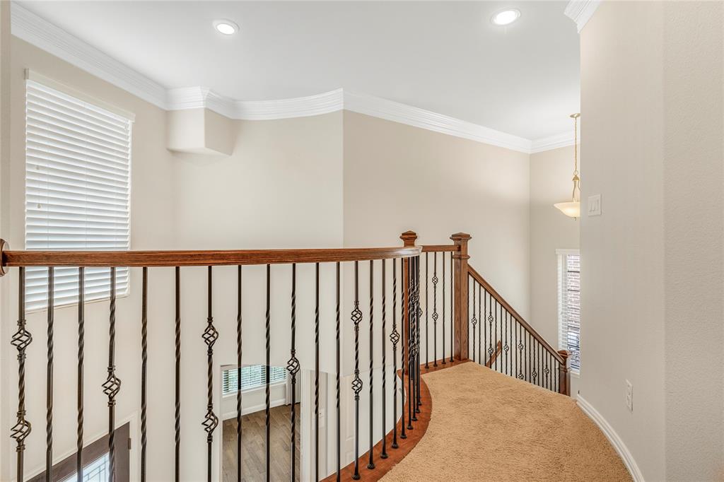 4560 Cheetah Trail Frisco, TX 75034 - Photo 18 of 38 a view of a hallway with wooden floor