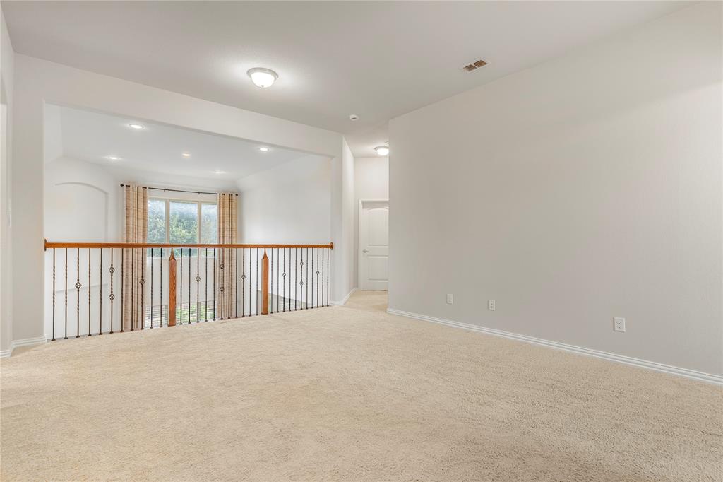 4560 Cheetah Trail Frisco, TX 75034 - Photo 20 of 38 a view of an empty room