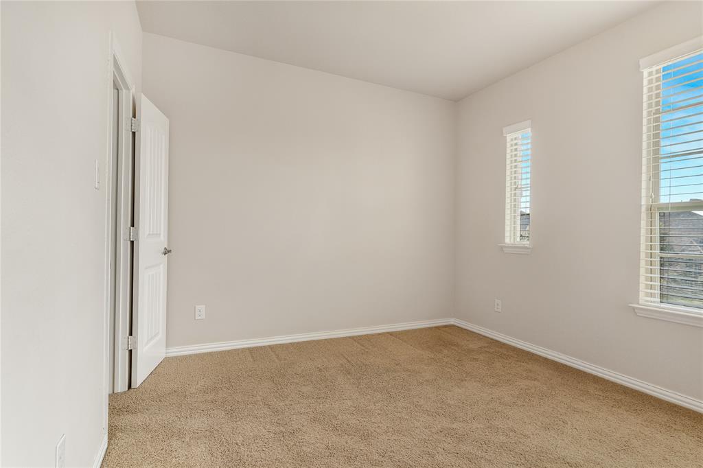 4560 Cheetah Trail Frisco, TX 75034 - Photo 24 of 38 an empty room with windows