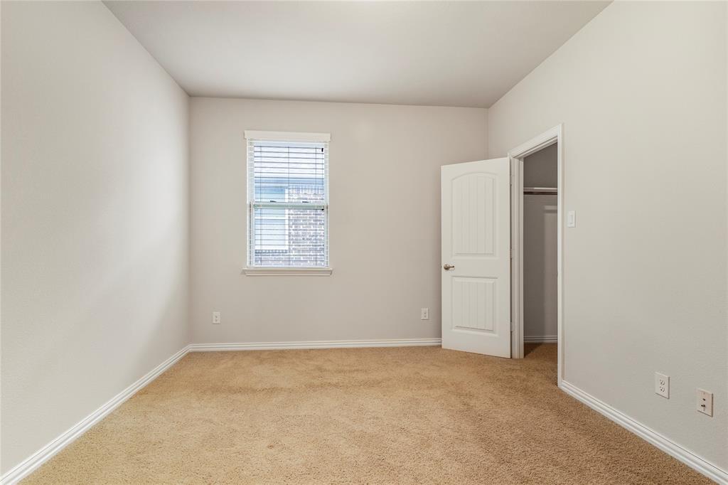 4560 Cheetah Trail Frisco, TX 75034 - Photo 26 of 38 an empty room with windows