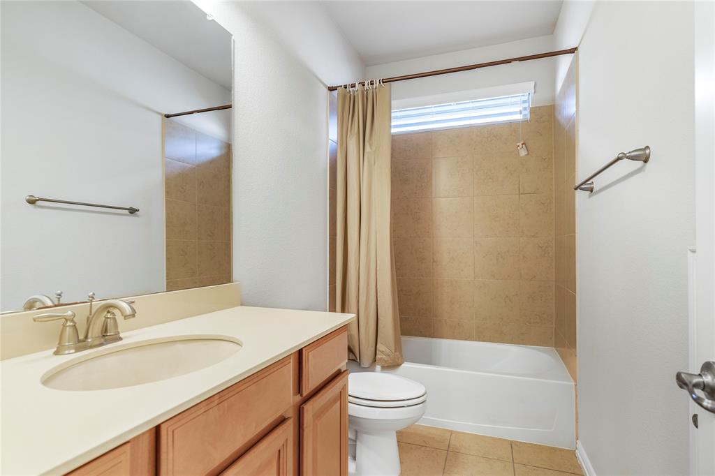 4560 Cheetah Trail Frisco, TX 75034 - Photo 27 of 38 a bathroom with a sink toilet and shower