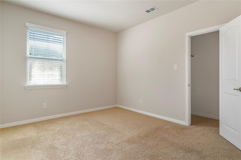4560 Cheetah Trail Frisco, TX 75034 - Photo 30 of 38 an empty room with a window