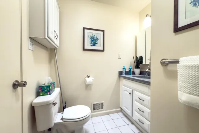 a view of a house with a yard and a large window