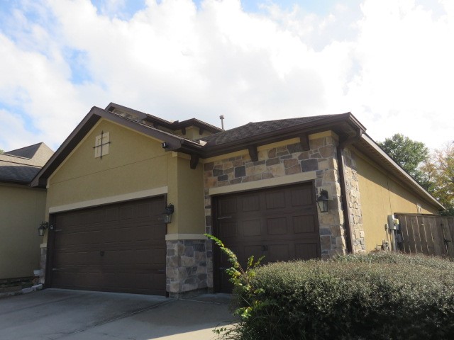 2607 Alan Lake Lane Spring, TX 77388 - Photo 2 of 42 a front view of house with mountain view