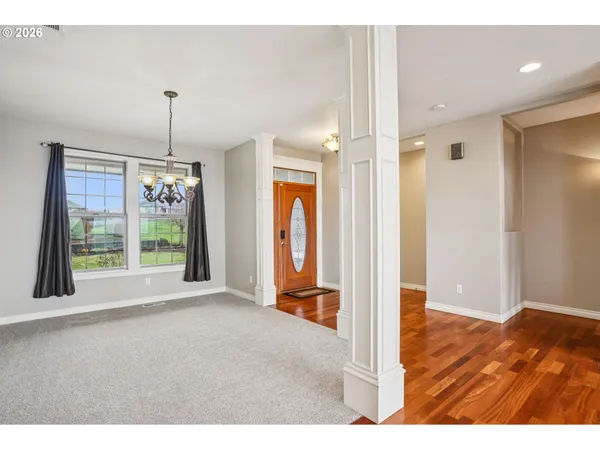 a view interior of a house wooden floor wooden floor and windows