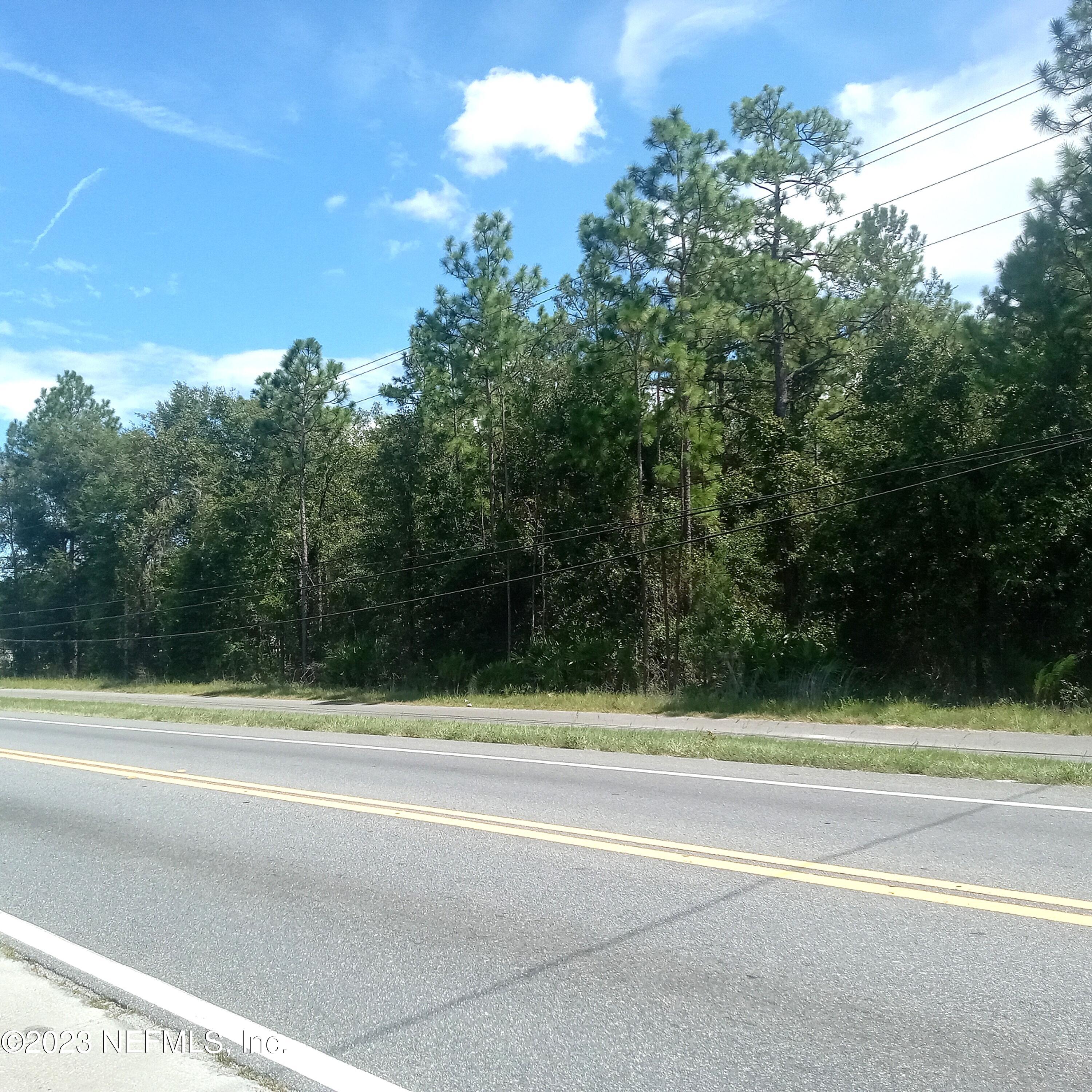 4189 County Road 218 Middleburg, FL 32068 - Photo 2 of 6 a view of a tennis court