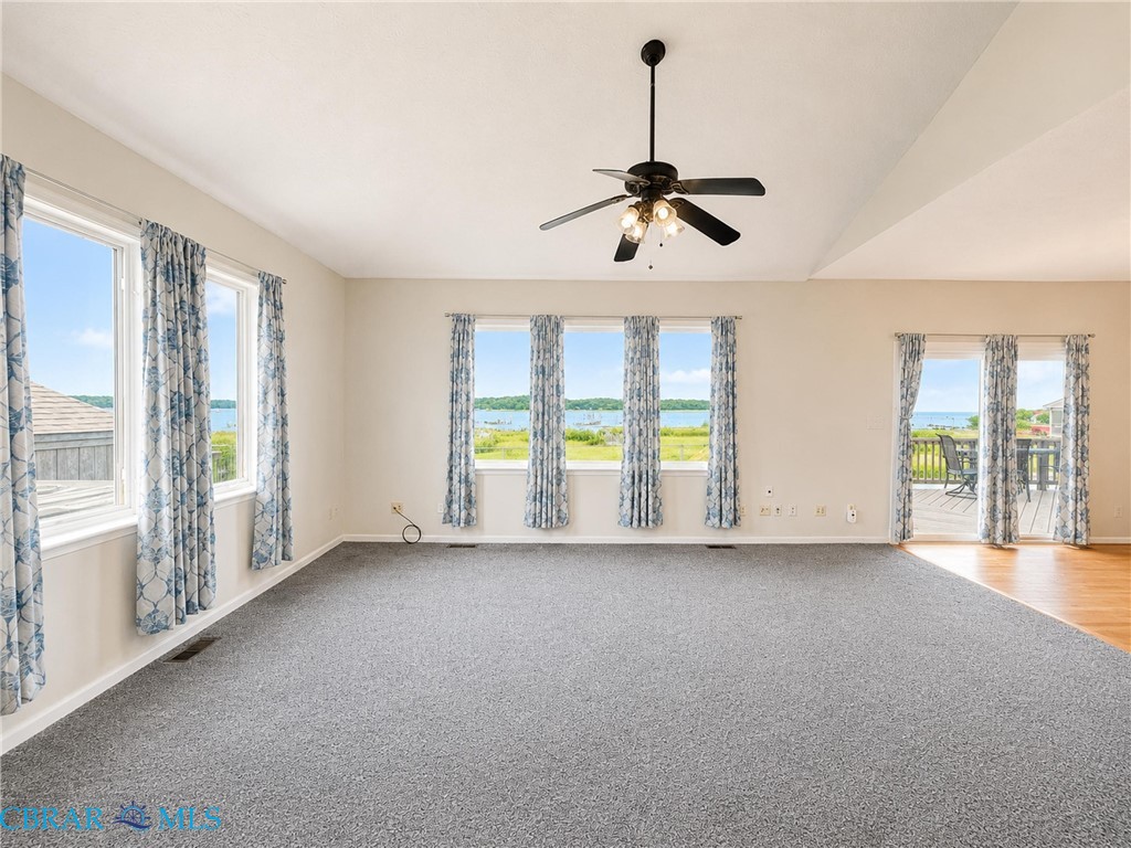 1214 Dandy Loop Road Yorktown, VA 23692 - Photo 25 of 65 a view of an empty room with a window