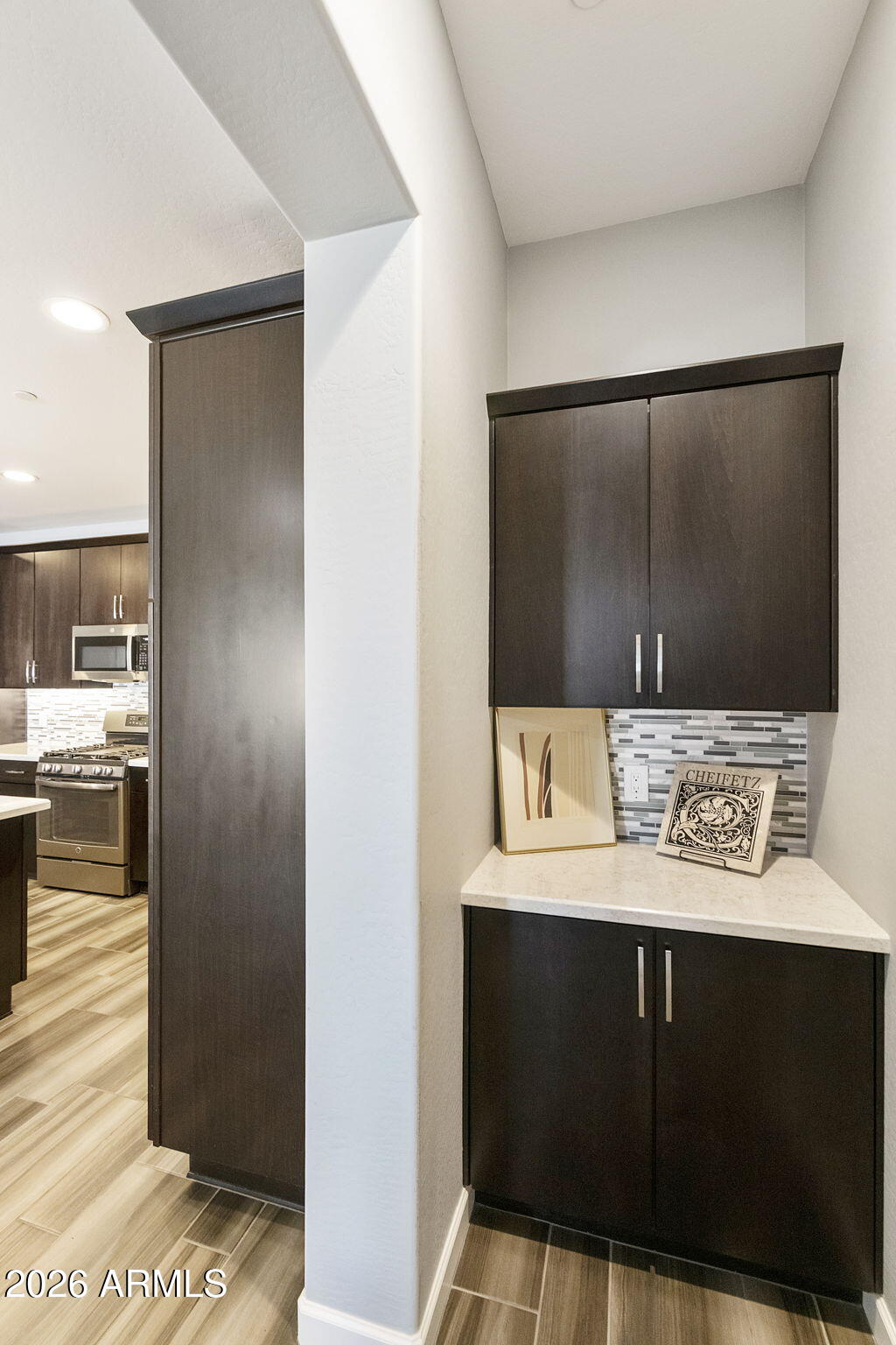 4777 South Fulton Ranch Boulevard, Unit 1086 Chandler, AZ 85248 - Photo 18 of 67 a bathroom with a sink and a mirror