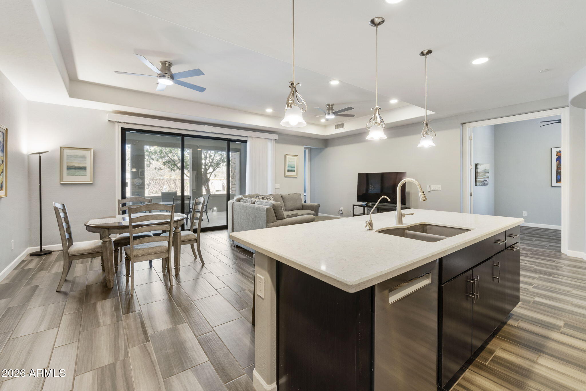4777 South Fulton Ranch Boulevard, Unit 1086 Chandler, AZ 85248 - Photo 19 of 67 a large kitchen with a table and chairs