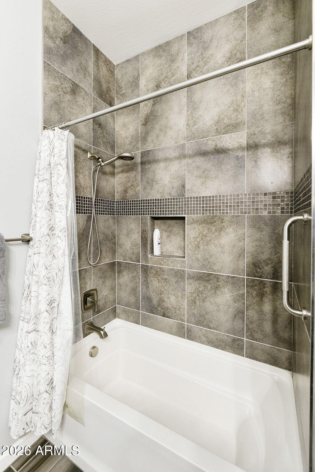 4777 South Fulton Ranch Boulevard, Unit 1086 Chandler, AZ 85248 - Photo 24 of 67 a bathroom with a bathtub and a shower