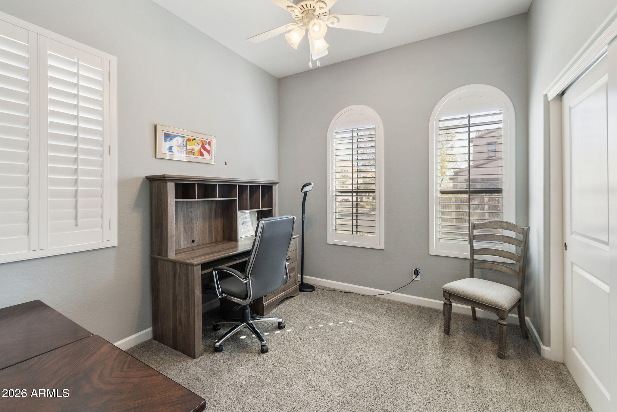 4777 South Fulton Ranch Boulevard, Unit 1086 Chandler, AZ 85248 - Photo 27 of 67 a view of a livingroom with workspace and a window