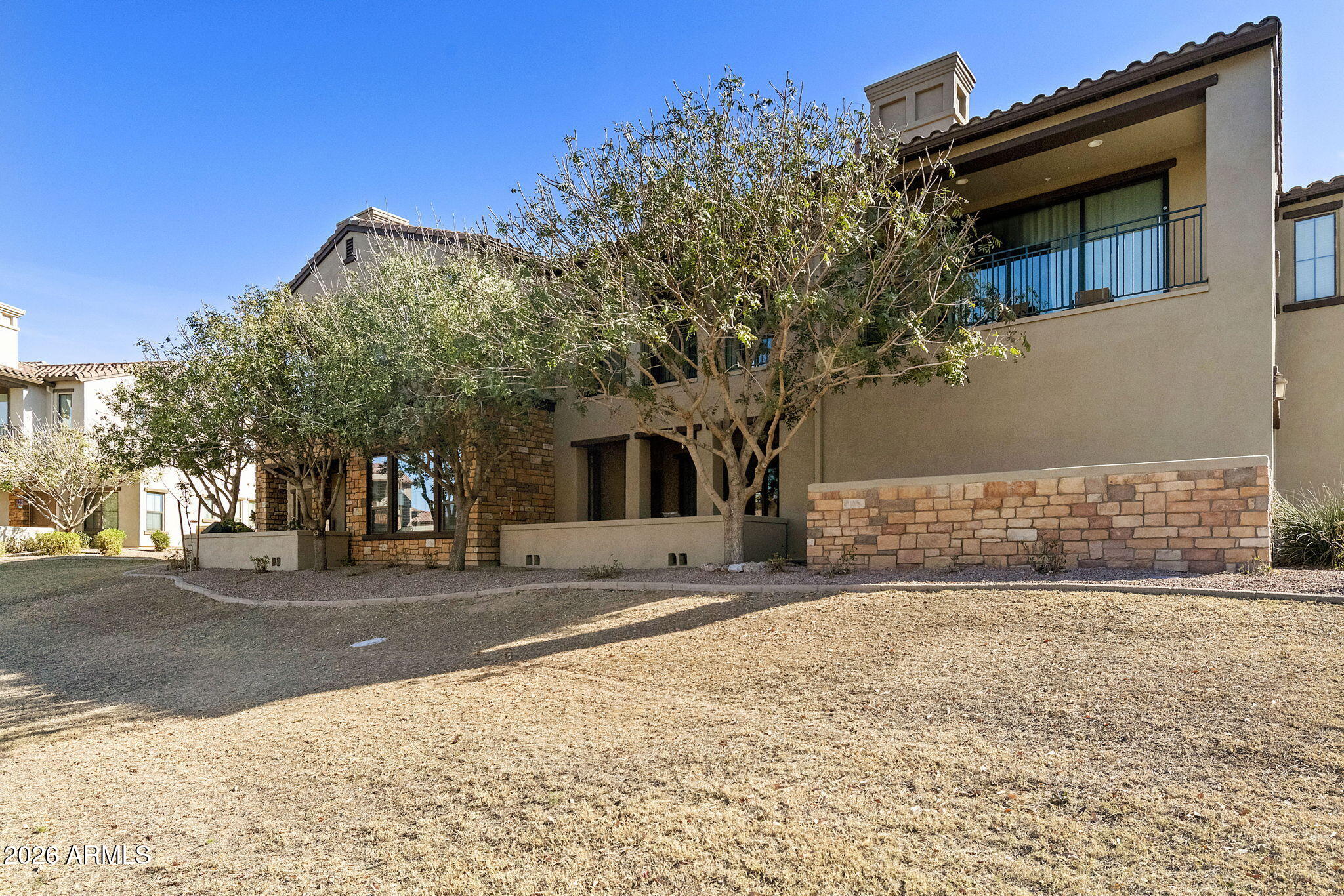 4777 South Fulton Ranch Boulevard, Unit 1086 Chandler, AZ 85248 - Photo 35 of 67 a pathway of a house with a yard