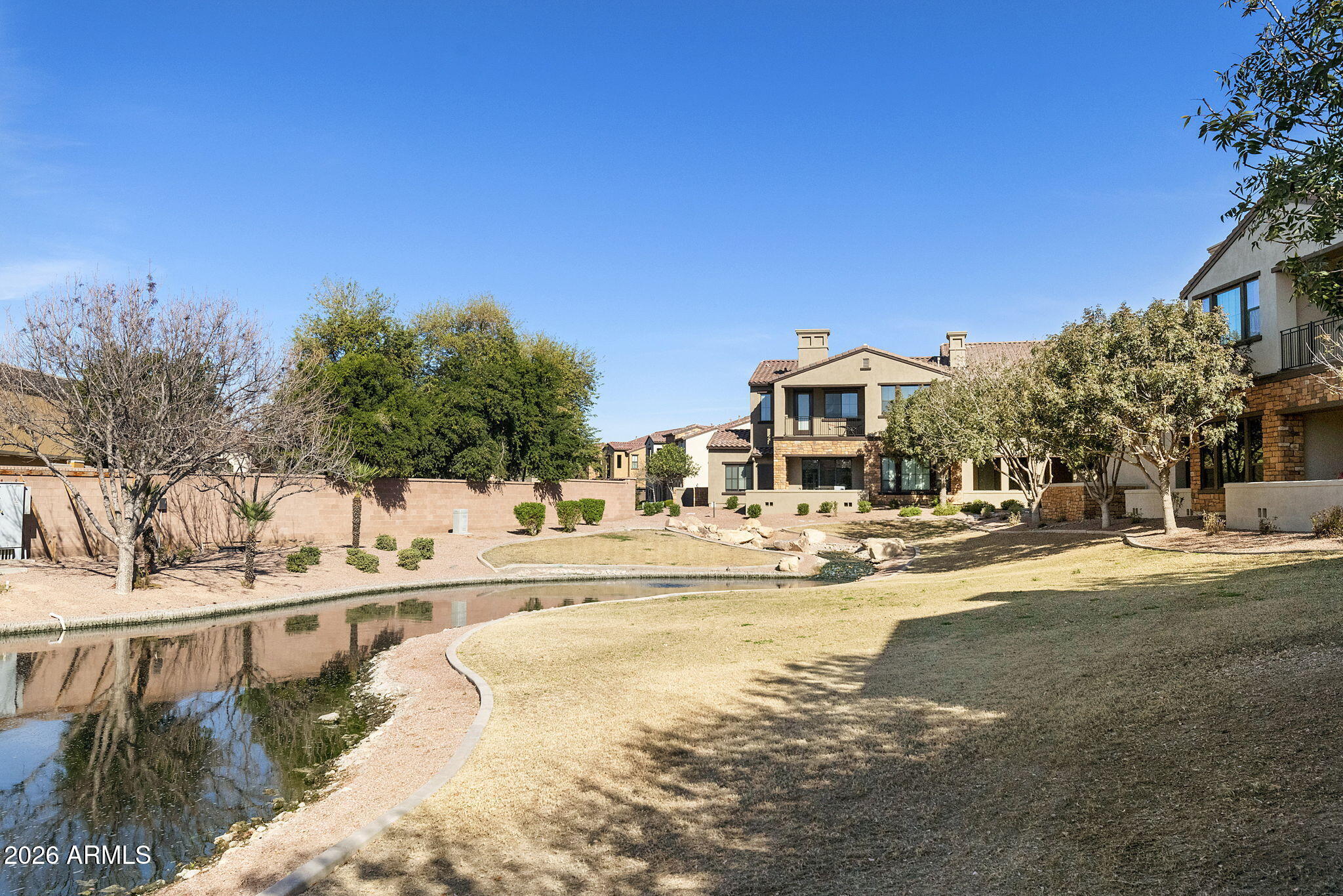 4777 South Fulton Ranch Boulevard, Unit 1086 Chandler, AZ 85248 - Photo 40 of 67 Patio view to lake