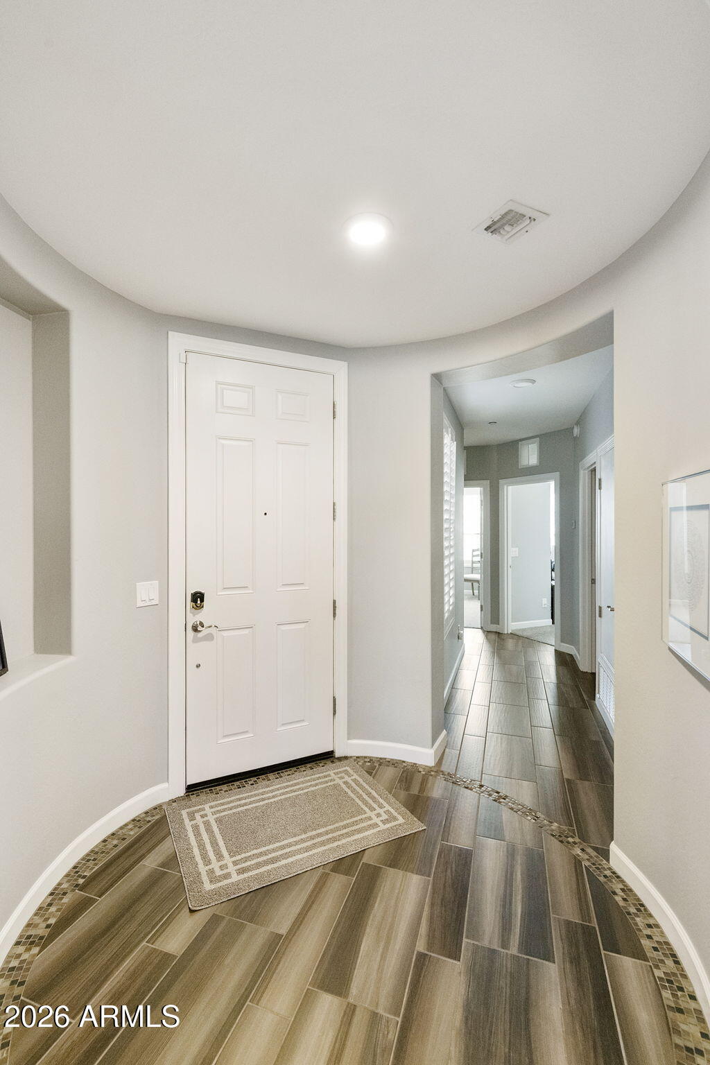 4777 South Fulton Ranch Boulevard, Unit 1086 Chandler, AZ 85248 - Photo 4 of 67 a view of a livingroom with wooden floor and staircase