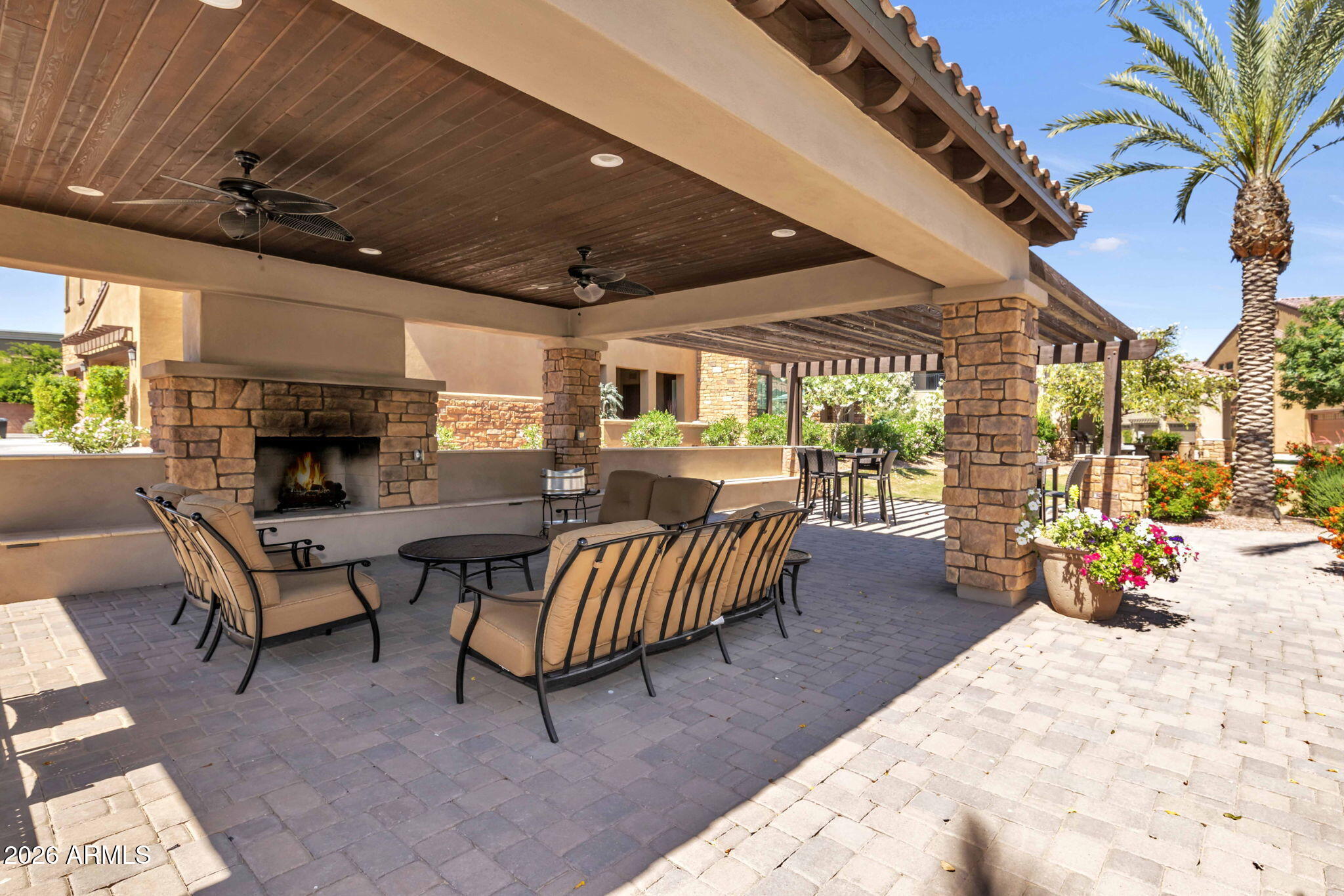 4777 South Fulton Ranch Boulevard, Unit 1086 Chandler, AZ 85248 - Photo 50 of 67 a outdoor living space with furniture and a fireplace