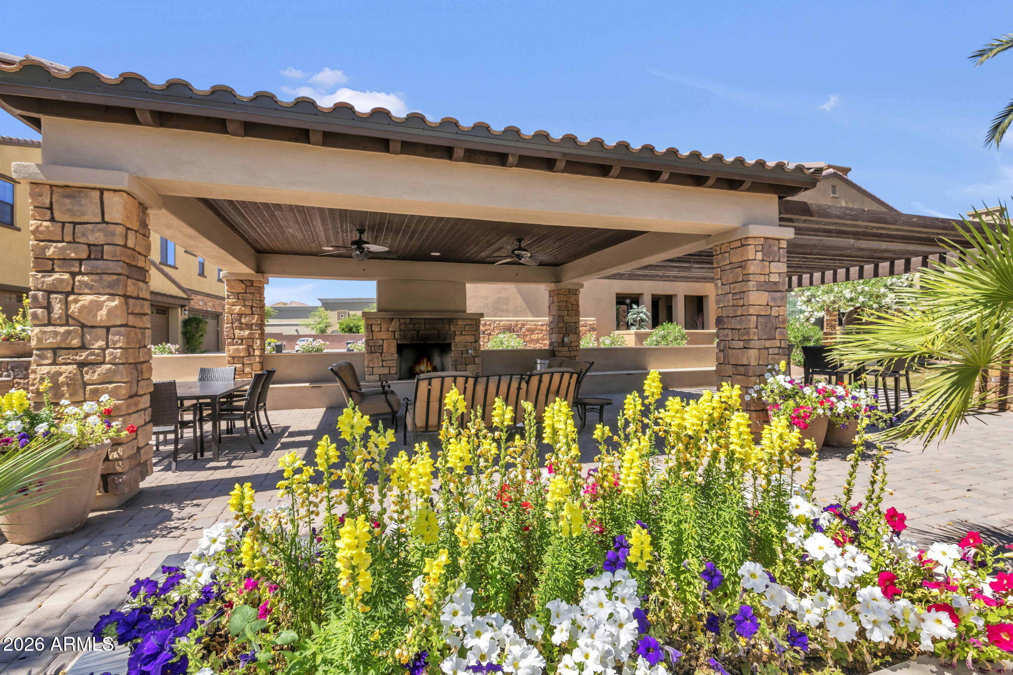 4777 South Fulton Ranch Boulevard, Unit 1086 Chandler, AZ 85248 - Photo 51 of 67 view of a patio with table and chairs and potted plants