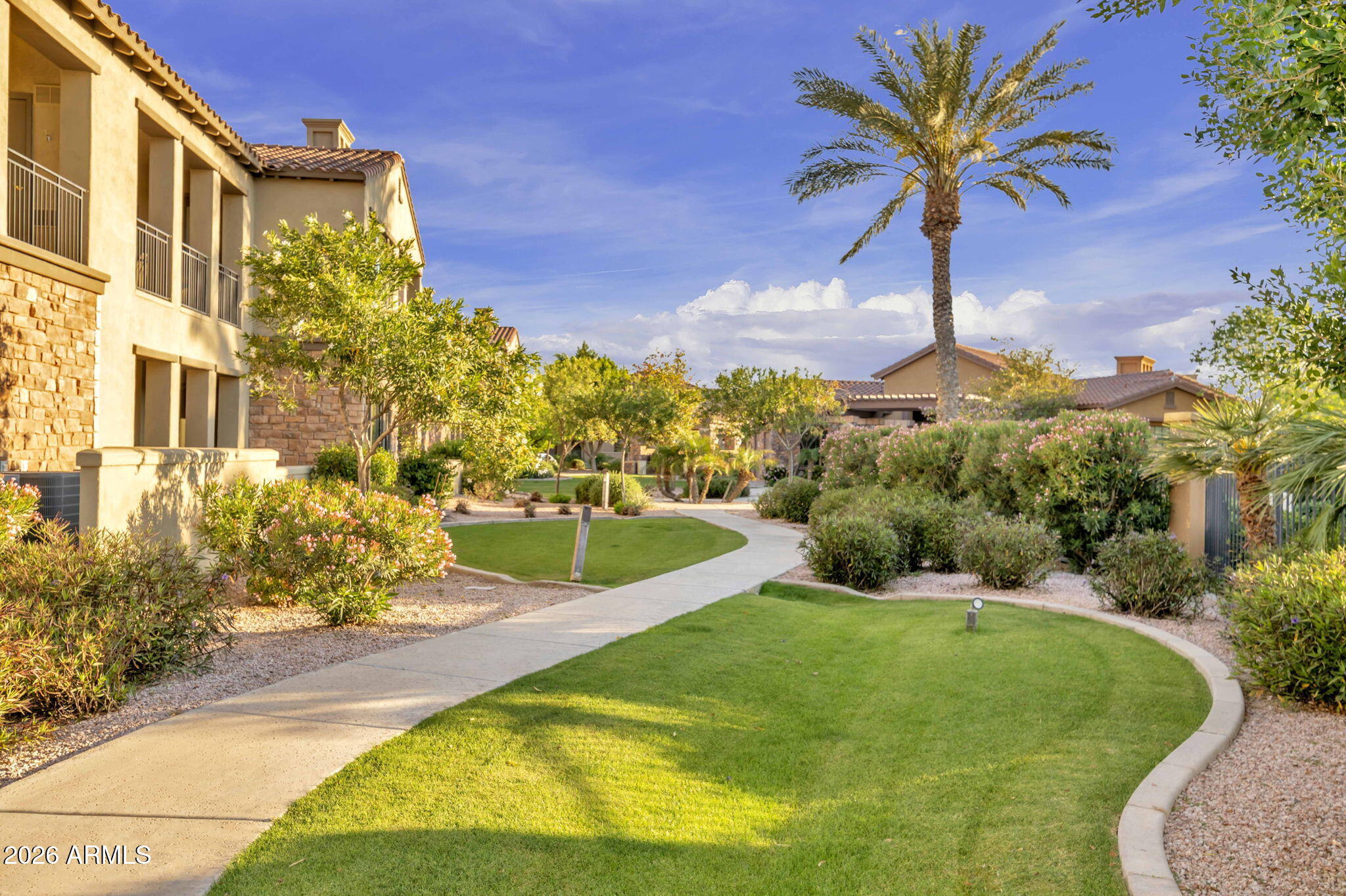 4777 South Fulton Ranch Boulevard, Unit 1086 Chandler, AZ 85248 - Photo 60 of 67 a view of a swimming pool with a yard