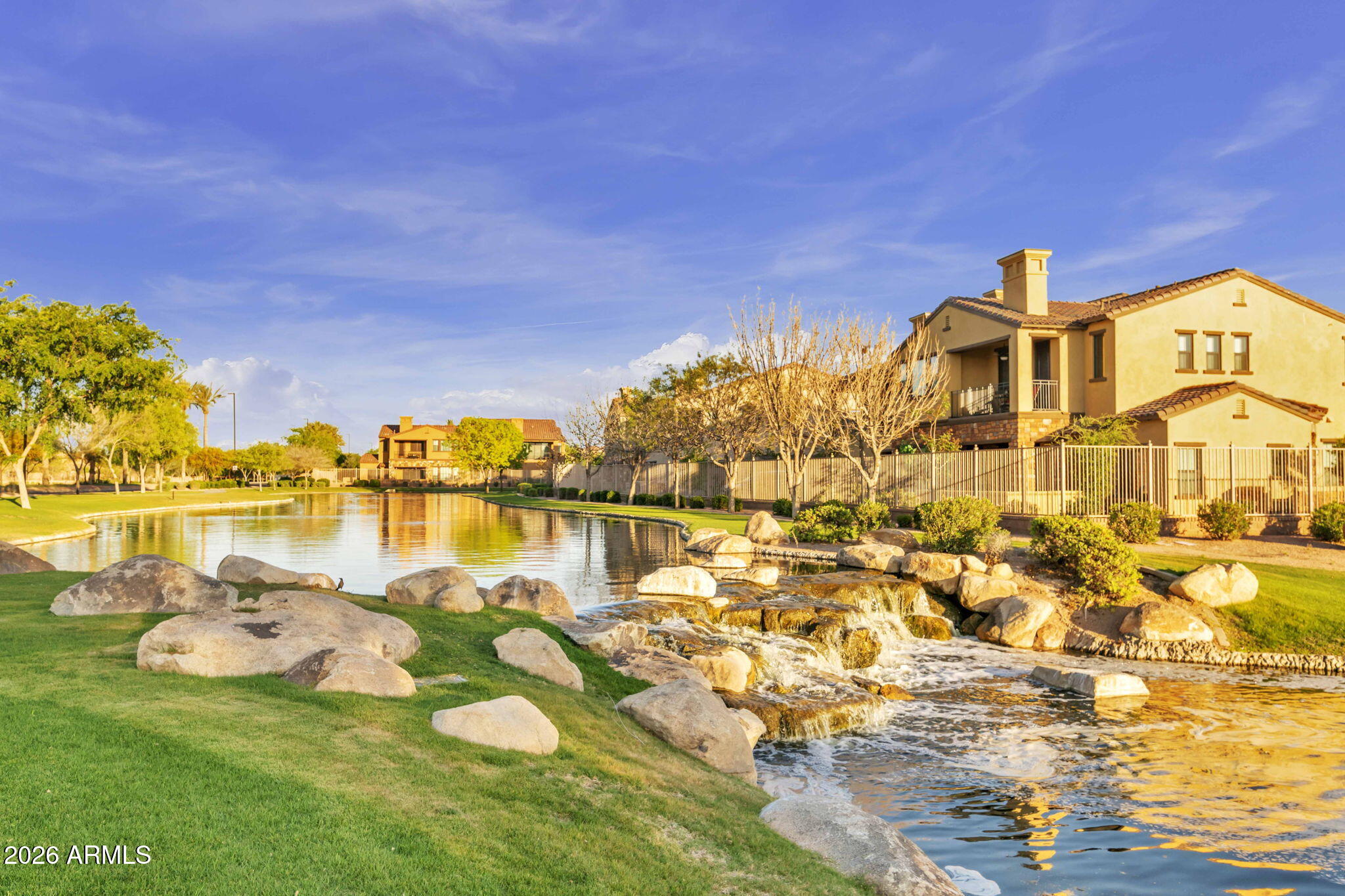 4777 South Fulton Ranch Boulevard, Unit 1086 Chandler, AZ 85248 - Photo 63 of 67 a front view of a house with lake view