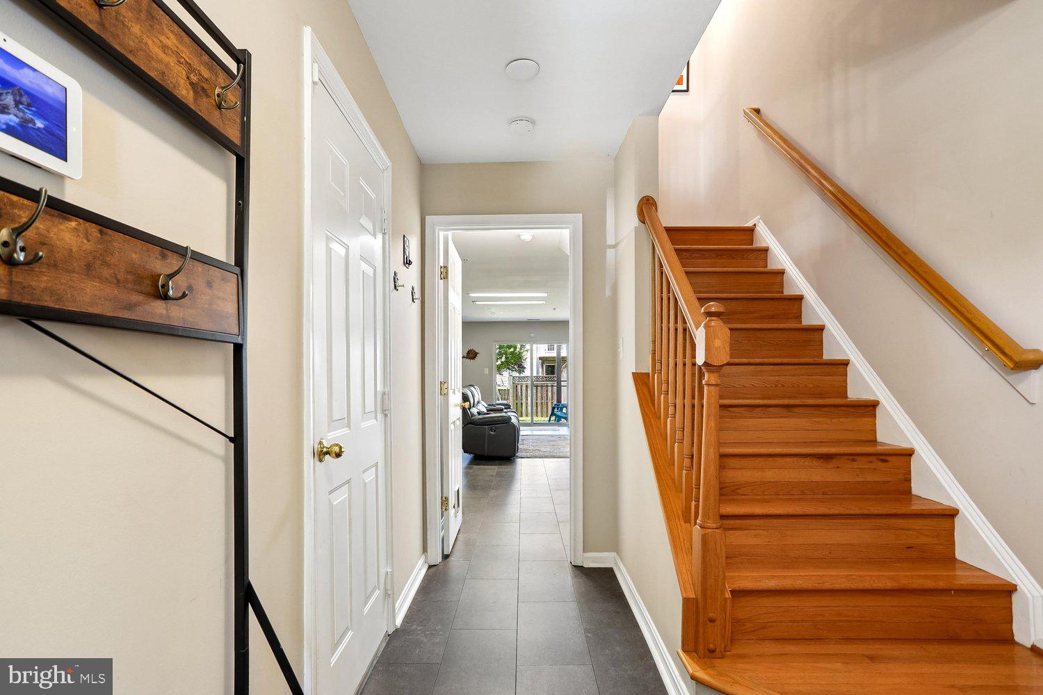 2530 Carrington Way Frederick, MD 21702 - Photo 30 of 38 a view of a hallway with wooden floor and entryway