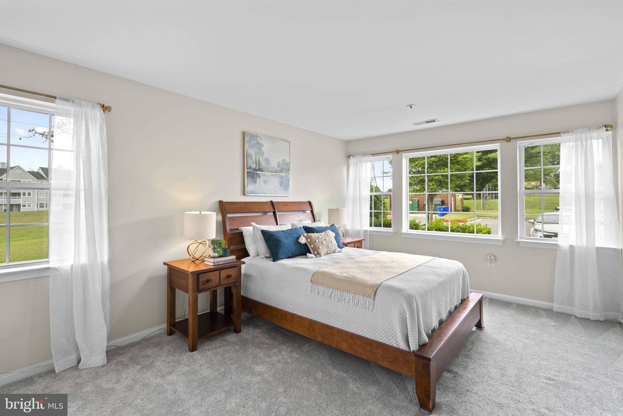 8513 Falls Run Road, Unit D Ellicott City, MD 21043 - Photo 13 of 22 Large & bright primary bedroom