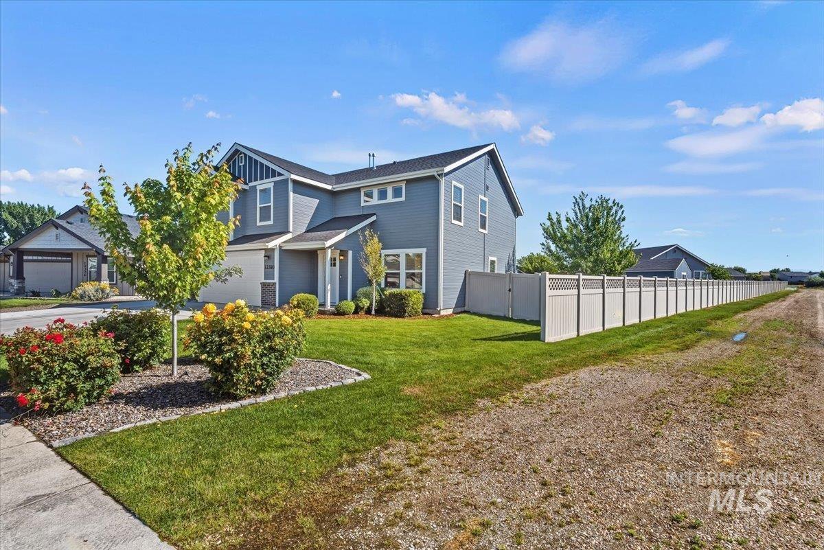 12310 West Hidden Point Drive Star, ID 83669 - Photo 37 of 48 Contemporary two-story residence with gray siding and white trim