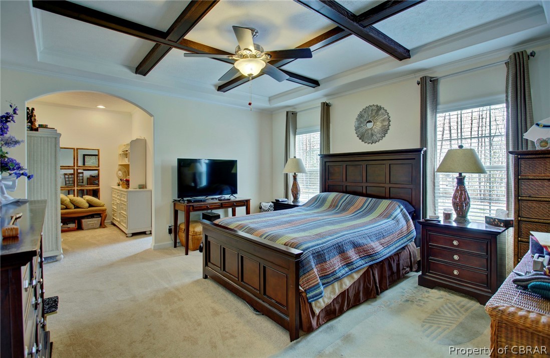 1496 Elsom Mascot Road Mattaponi, VA 23110 - Photo 17 of 33 a bedroom with a bed and a flat screen tv