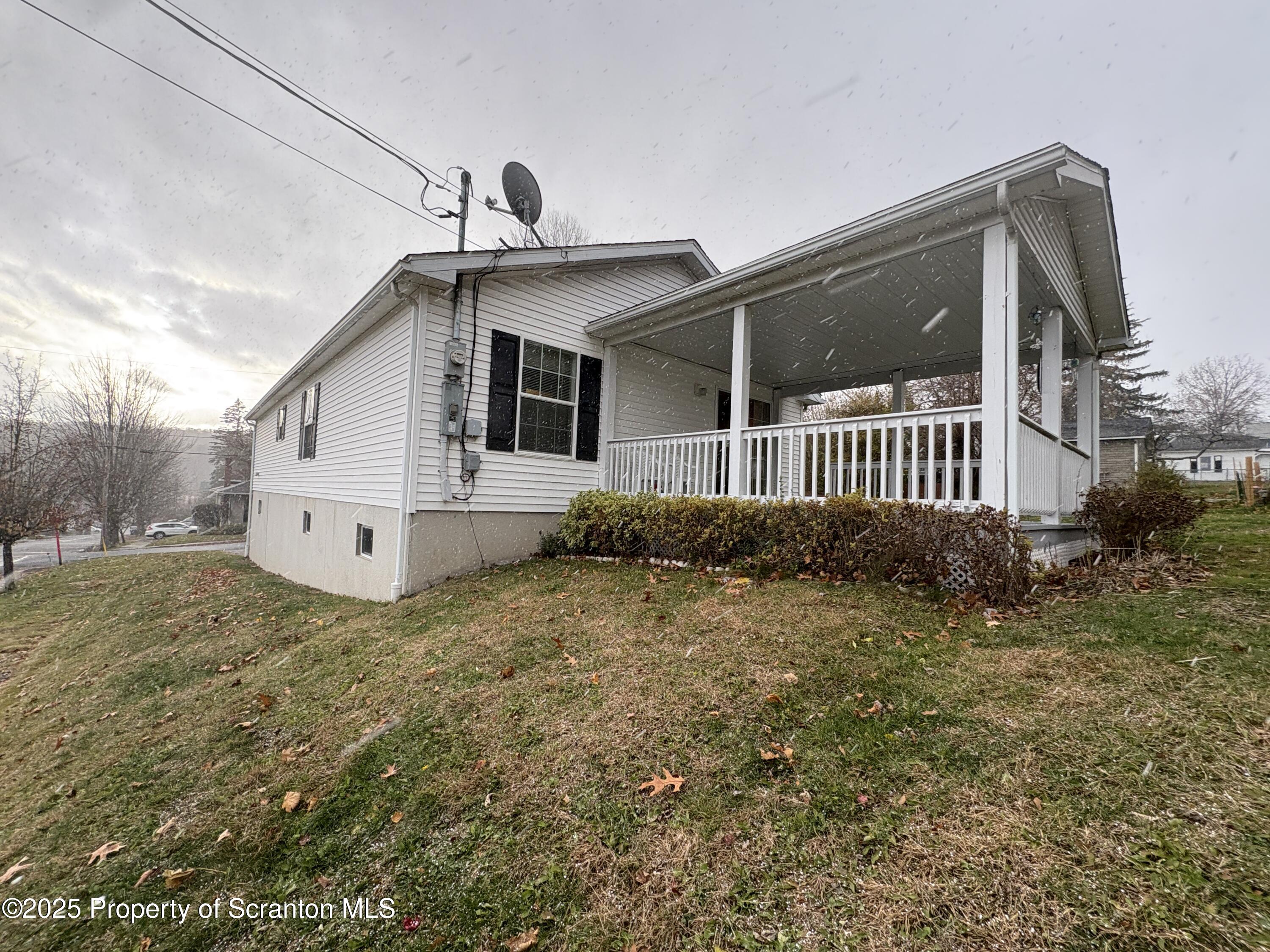 813 Poplar Street Clarks Summit, PA 18411 - Photo 21 of 33 a view of a house with a yard