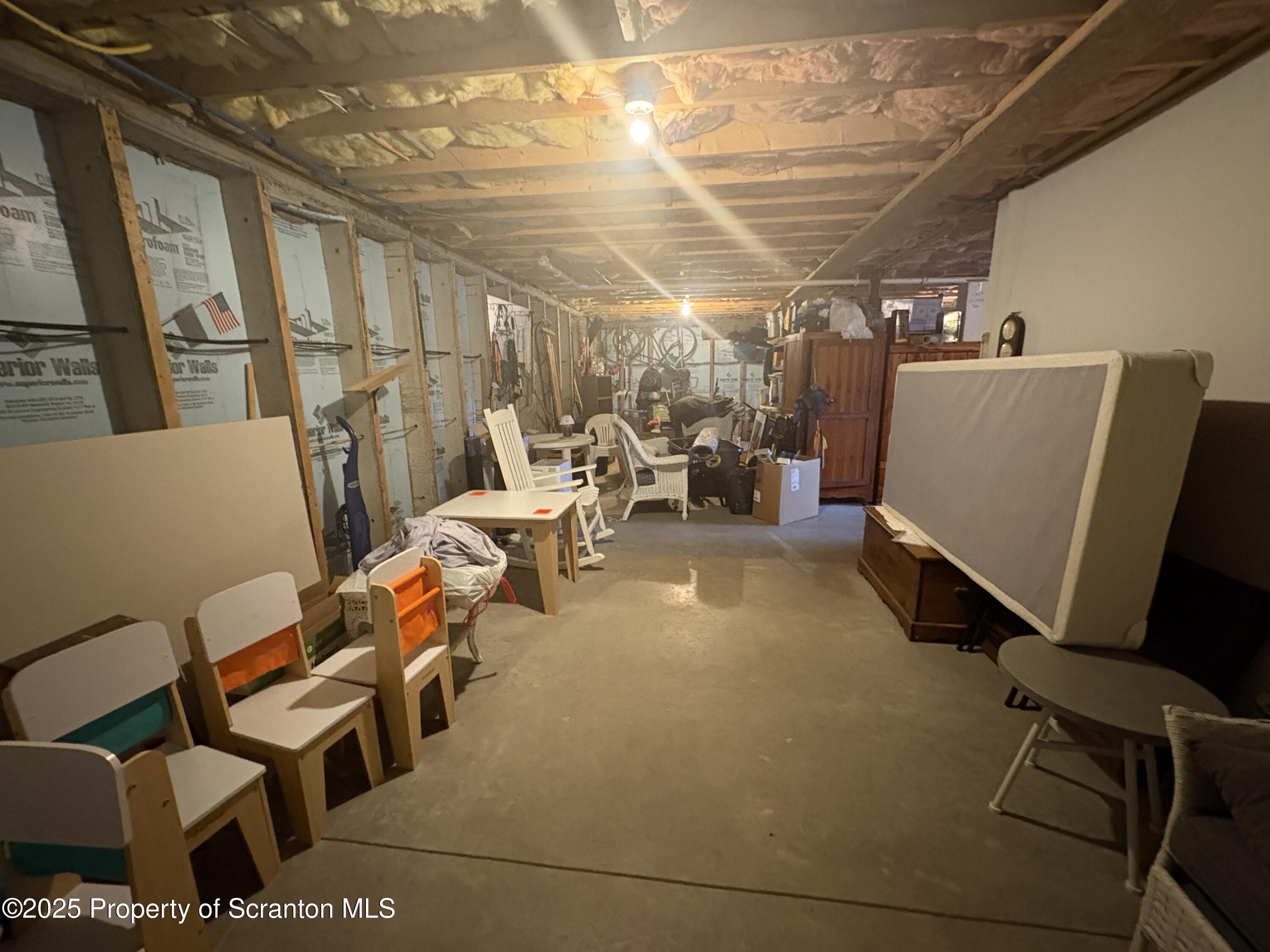 813 Poplar Street Clarks Summit, PA 18411 - Photo 30 of 33 a view of a patio with table and chairs