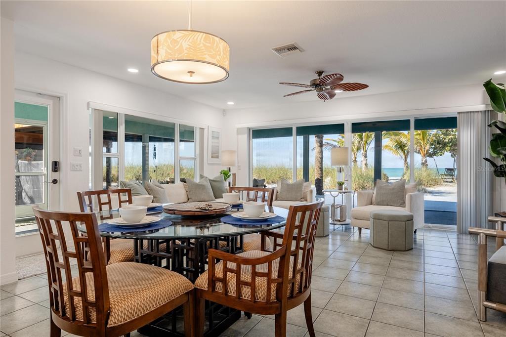 2630 North Beach Road Englewood, FL 34223 - Photo 30 of 98 a view of a dining room with furniture window and outside view