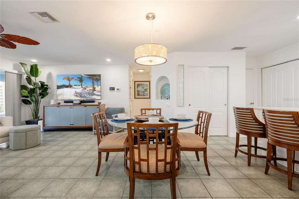 2630 North Beach Road Englewood, FL 34223 - Photo 32 of 98 a view of a dining room with furniture