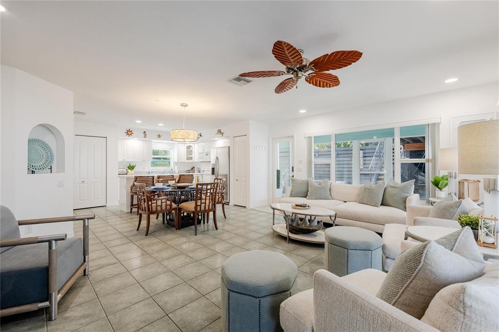 2630 North Beach Road Englewood, FL 34223 - Photo 37 of 98 a living room with furniture and a large window