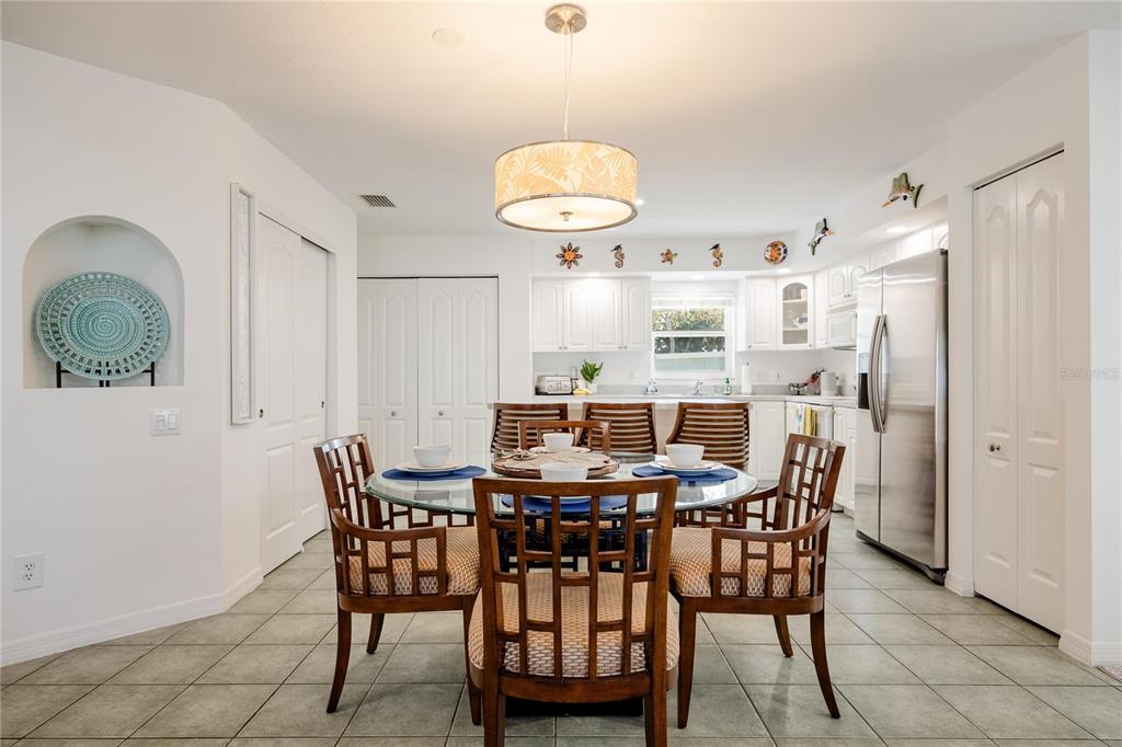 2630 North Beach Road Englewood, FL 34223 - Photo 39 of 98 a view of a dining room with furniture