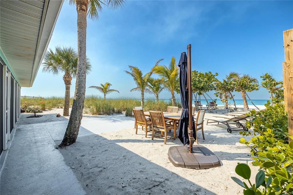 2630 North Beach Road Englewood, FL 34223 - Photo 53 of 98 a view of a swimming pool with a patio