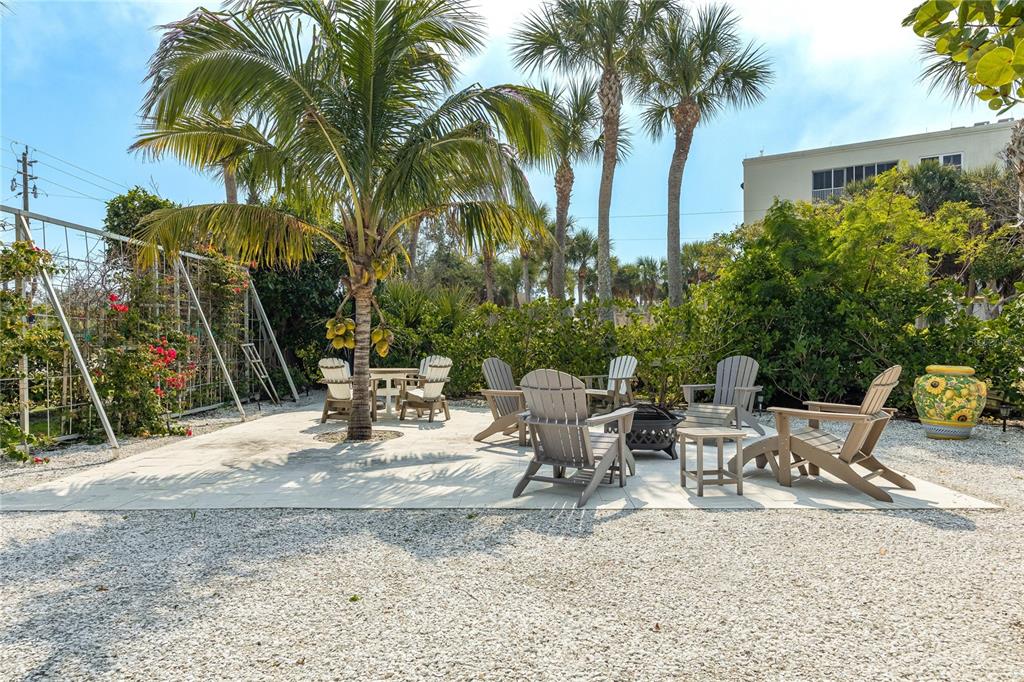 2630 North Beach Road Englewood, FL 34223 - Photo 71 of 98 a view of the patio with a chairs and table in the patio
