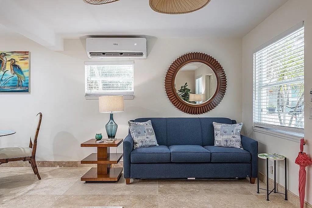 2630 North Beach Road Englewood, FL 34223 - Photo 92 of 98 a living room with furniture and a window