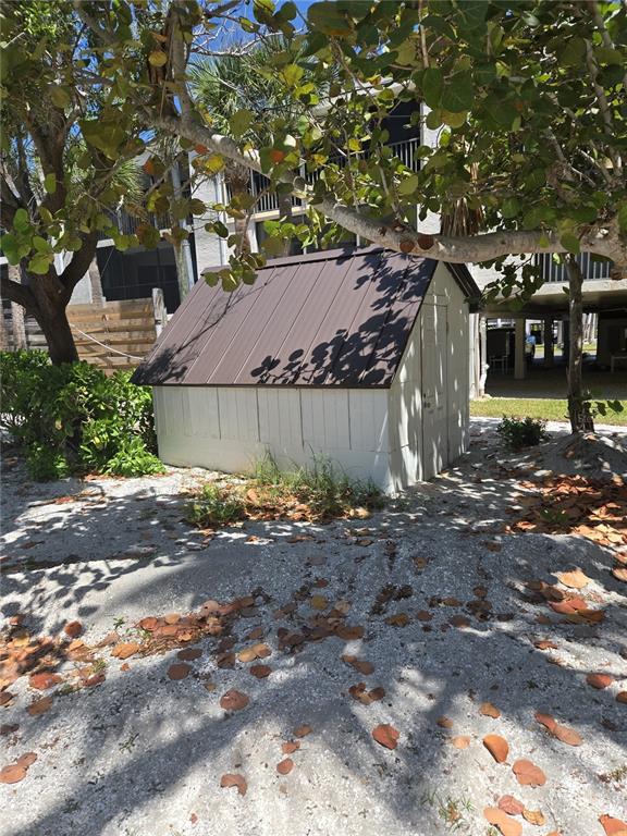 2630 North Beach Road Englewood, FL 34223 - Photo 98 of 98 a view of a house with a yard