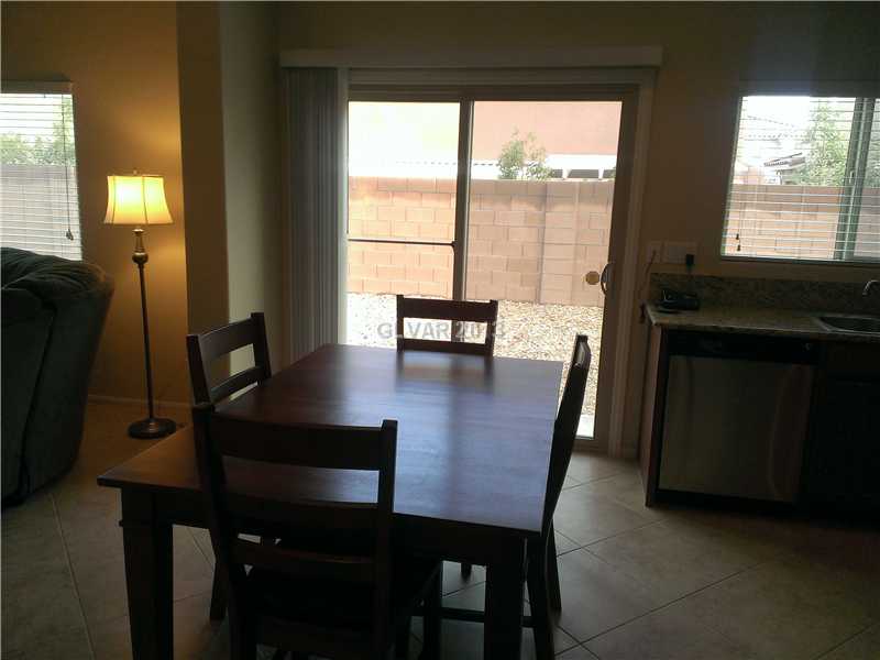 10586 Cave Ridge Street Las Vegas, NV 89179 - Photo 3 of 18 Dining Room.