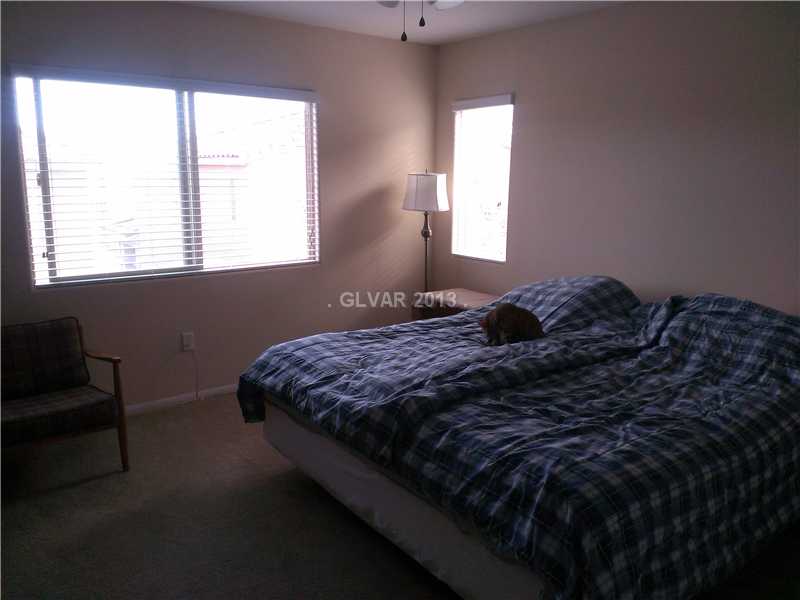 10586 Cave Ridge Street Las Vegas, NV 89179 - Photo 8 of 18 Master Bedroom.