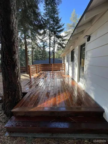 a view of backyard with hardwood