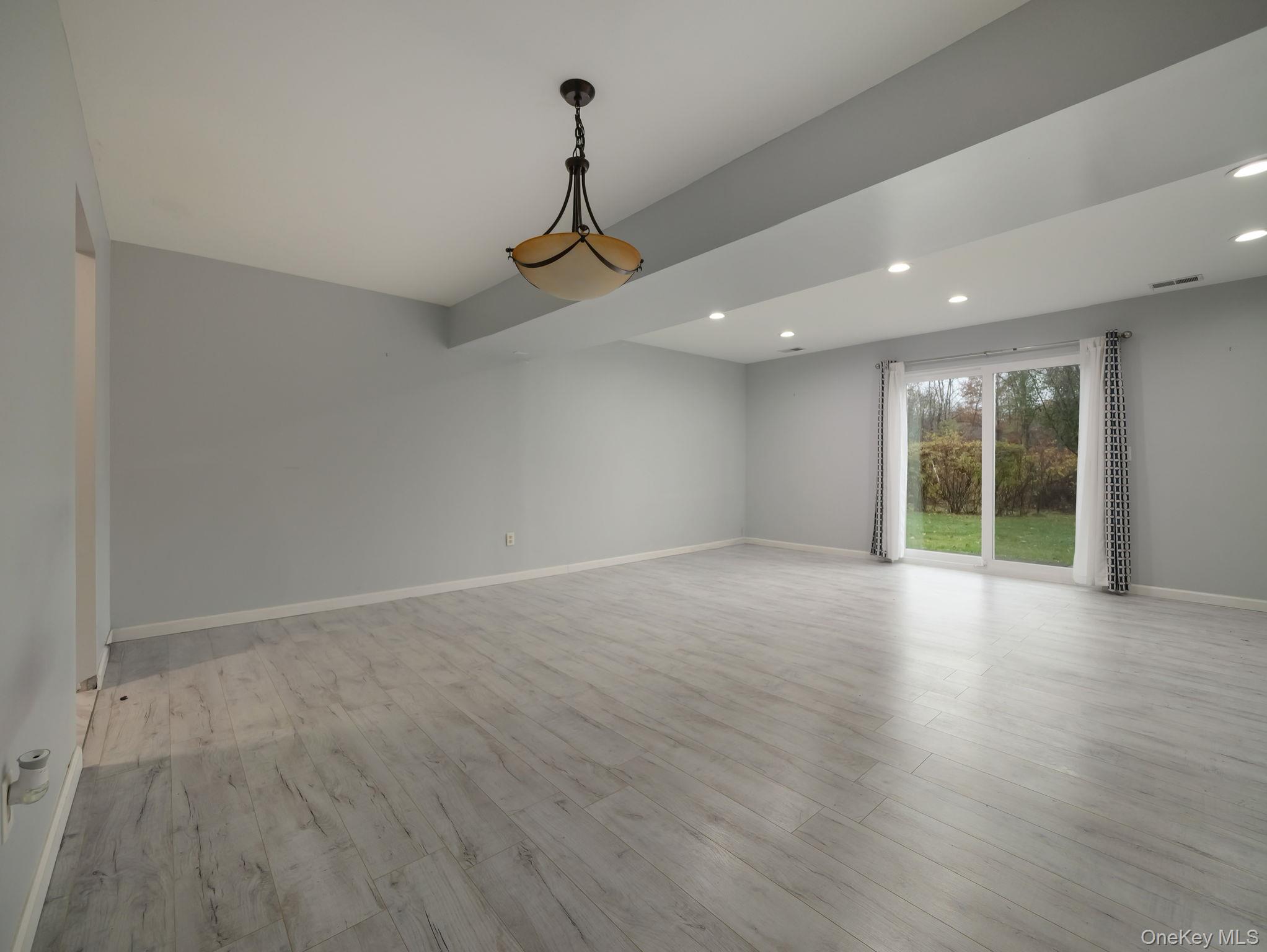 276 Temple Hill Road, Unit 707 New Windsor, NY 12553 - Photo 11 of 23 a view of an empty room with a window