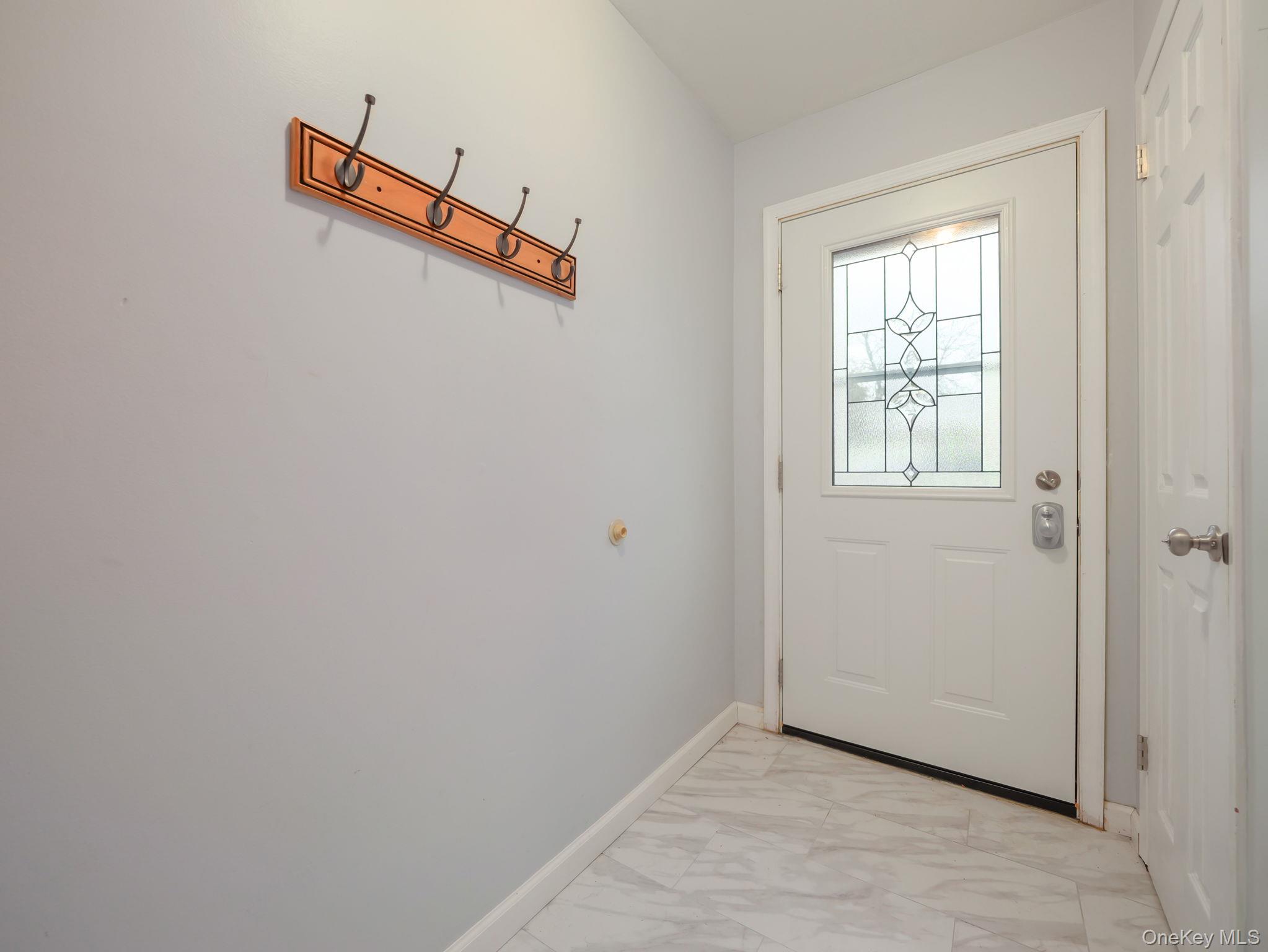 276 Temple Hill Road, Unit 707 New Windsor, NY 12553 - Photo 3 of 23 an empty room with windows